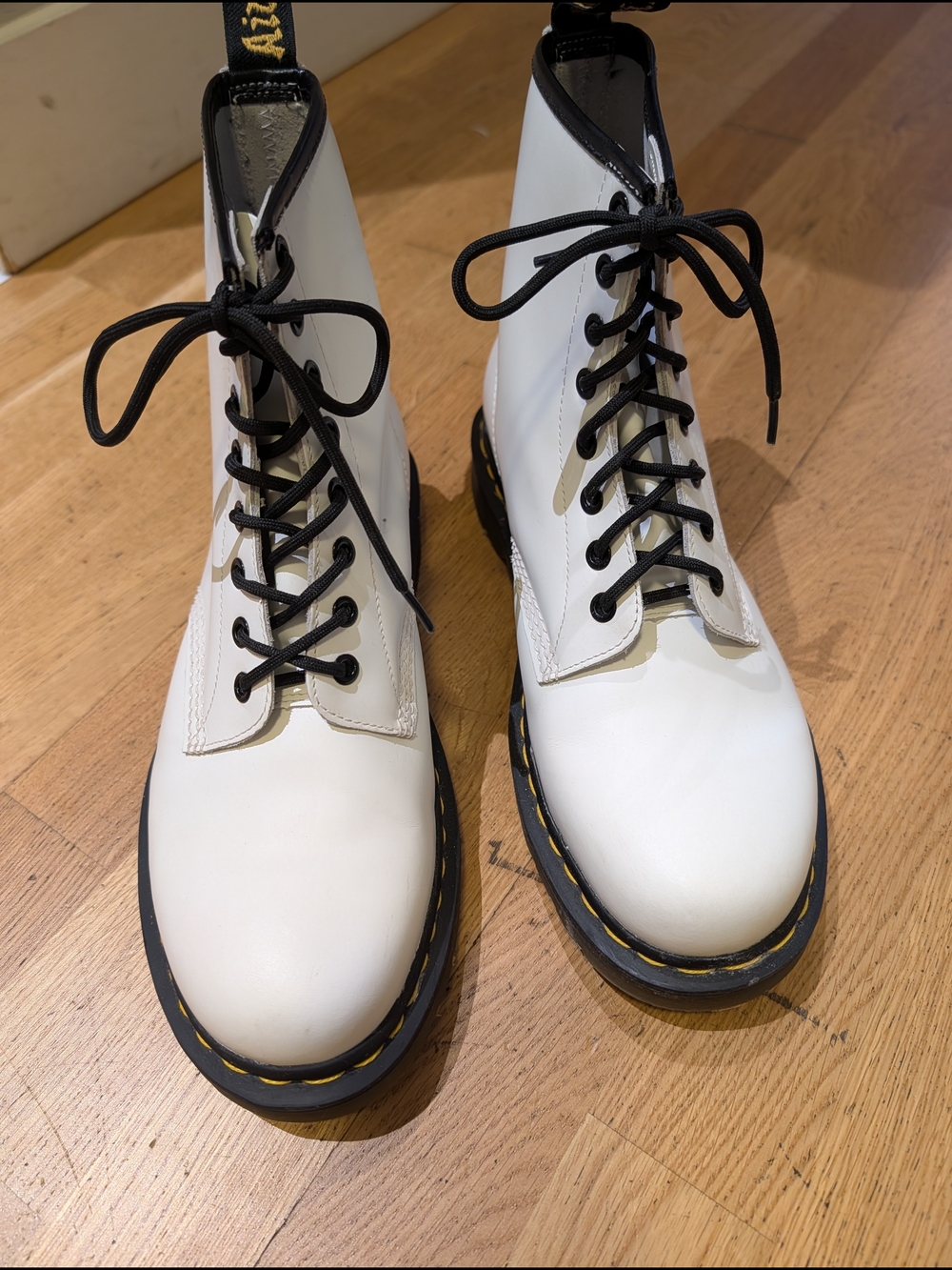 Dr. Martens White Leather Lace-Up Combat Boots with Black Trim